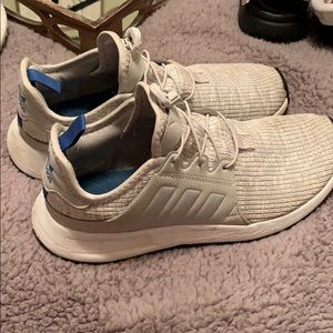 Grey and blue adidas tennis shoes